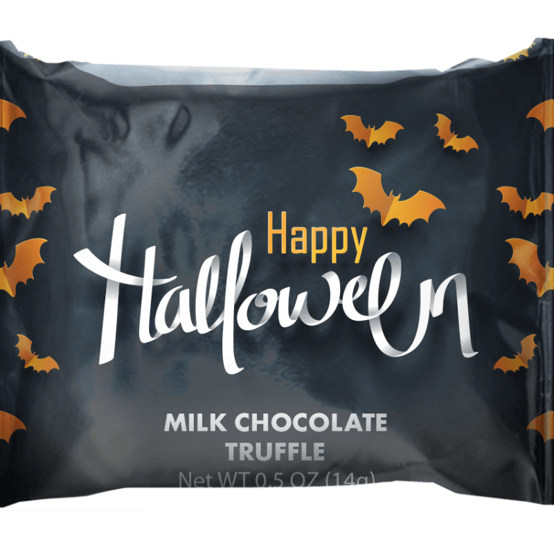 Happy Halloween truffles wrapped in festive holiday designs.